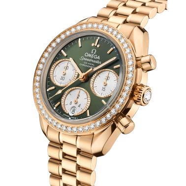 Montre Omega Speedmaster 38 Diamants Chronographe Co-Axial Chronometer automatique Or Moonshine cadran vert bracelet or jaune 38