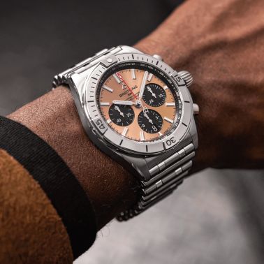 Montre Breitling Chronomat B01 Chronograph cadran cuivre bracelet acier 42 mm AB0134101K1A1