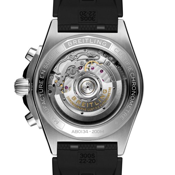 Montre Breitling Chronomat B01 Chronograph automatique lunette sertie cadran noir bracelet caoutchouc noir Rouleaux 42 mm AB0134