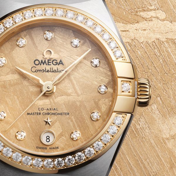Montre Omega Constellation Météorite automatique or jaune & acier cadran or bracelet acier 29 mm