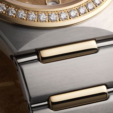 Montre Omega Constellation Météorite automatique or jaune & acier cadran or bracelet acier 29 mm