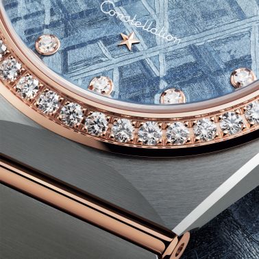 Montre Omega Constellation Météorite quartz or sedna & acier cadran bleu bracelet acier 28 mm