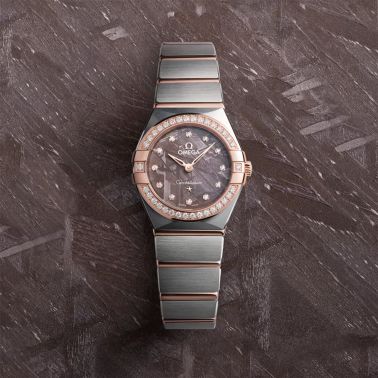 Montre Omega Constellation Météorite quartz or sedna & acier cadran lilas bracelet acier 25 mm