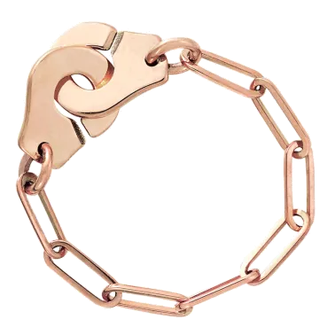Bague Dinh Van Menottes R7 en or rose sur chaîne