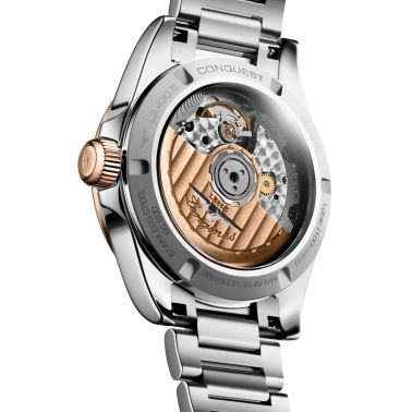 Montre Longines Conquest Or rose automatique cadran bleu bracelet acier et or rose 34 mm