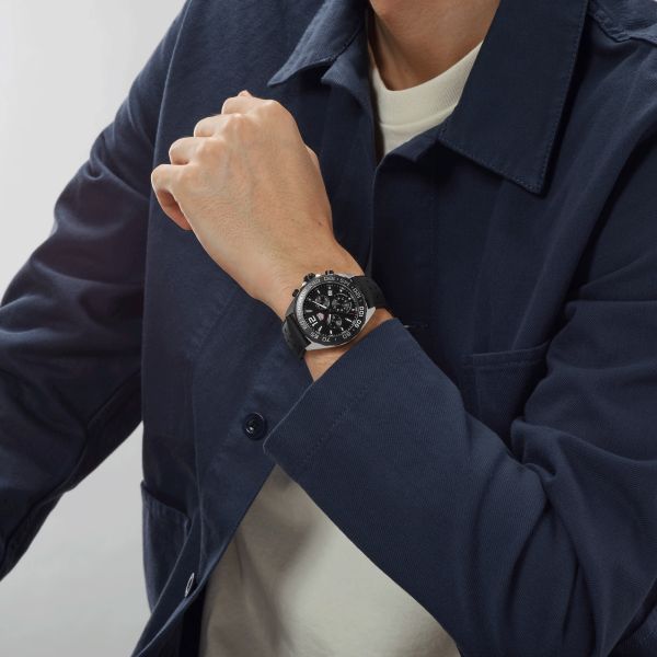 TAG Heuer Formula 1 quartz watch black dial black steel bezel black perforated rubber strap 43 mm