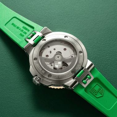 Montre Oris Aquis Date Calibre 400 Or et Acier automatique cadran vert bracelet caoutchouc 41,5 mm