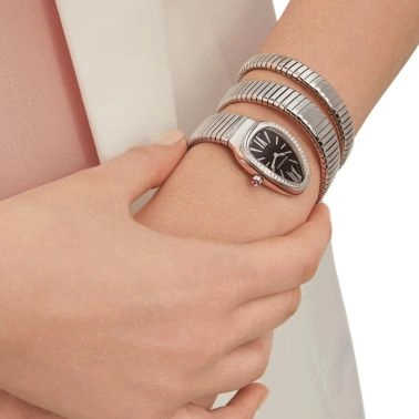 Montre Bulgari Serpenti Tubogas L quartz lunette sertie cadran noir bracelet acier double tour 35 mm 103818