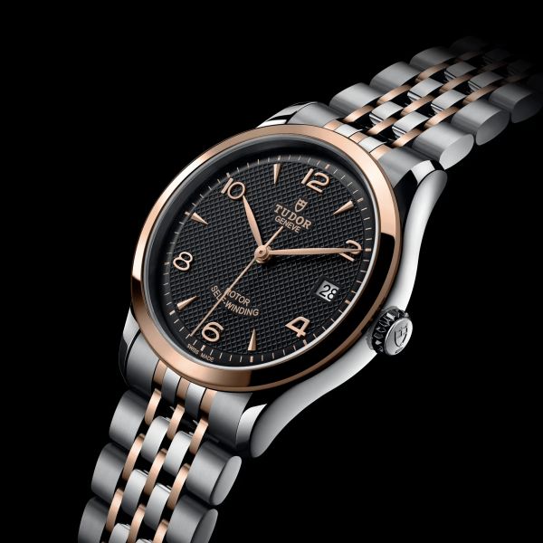 Montre Tudor 1926 automatique lunette or rose cadran noir bracelet acier et or rose 36 mm M91451-0003