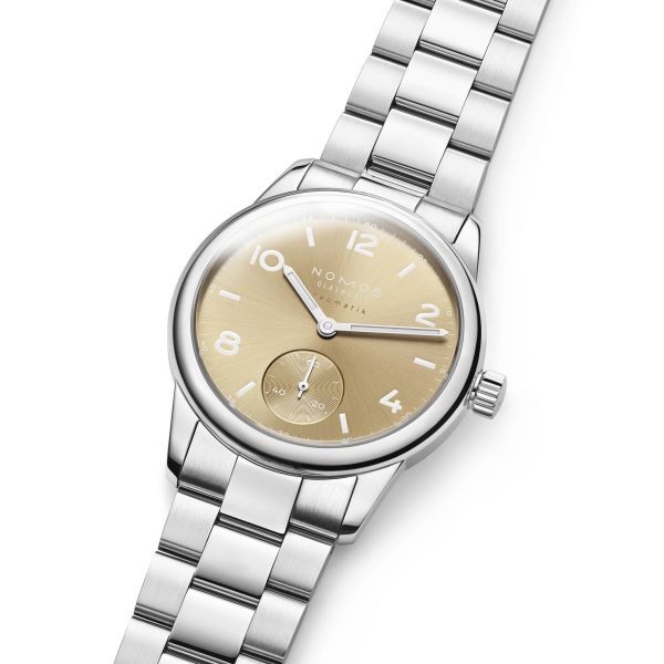 Nomos Club Sport Neomatik 34 Gold automatic sapphire back golden dial steel bracelet 34 mm