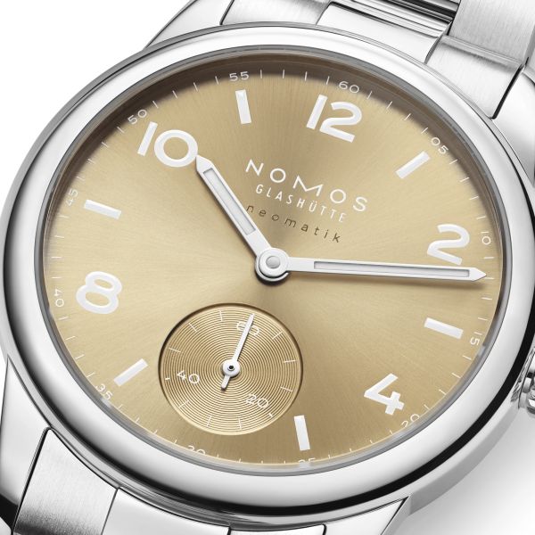 Nomos Club Sport Neomatik 34 Gold automatic sapphire back golden dial steel bracelet 34 mm