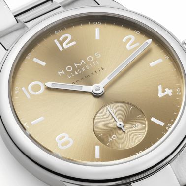 Nomos Club Sport Neomatik 34 Gold automatic sapphire back golden dial steel bracelet 34 mm