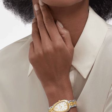 Montre Bulgari Serpenti Seduttori quartz cadran blanc opalin bracelet acier et or jaune 33 mm 103955