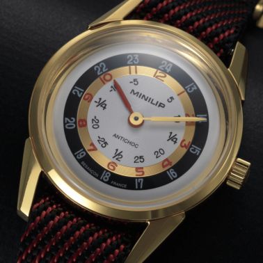 Montre Lip MiniLIP Dorée quartz cadran argenté bracelet tissu rouge 29 mm