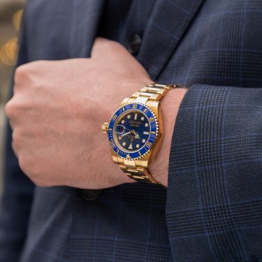 Rolex Submariner Date 18k yellow gold 116618LB automatic 40 mm stickered