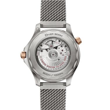 Montre Omega Seamaster Diver 300m Bronze Gold Co-Axial Master Chronometer cadran vert bracelet acier milanais 42 mm