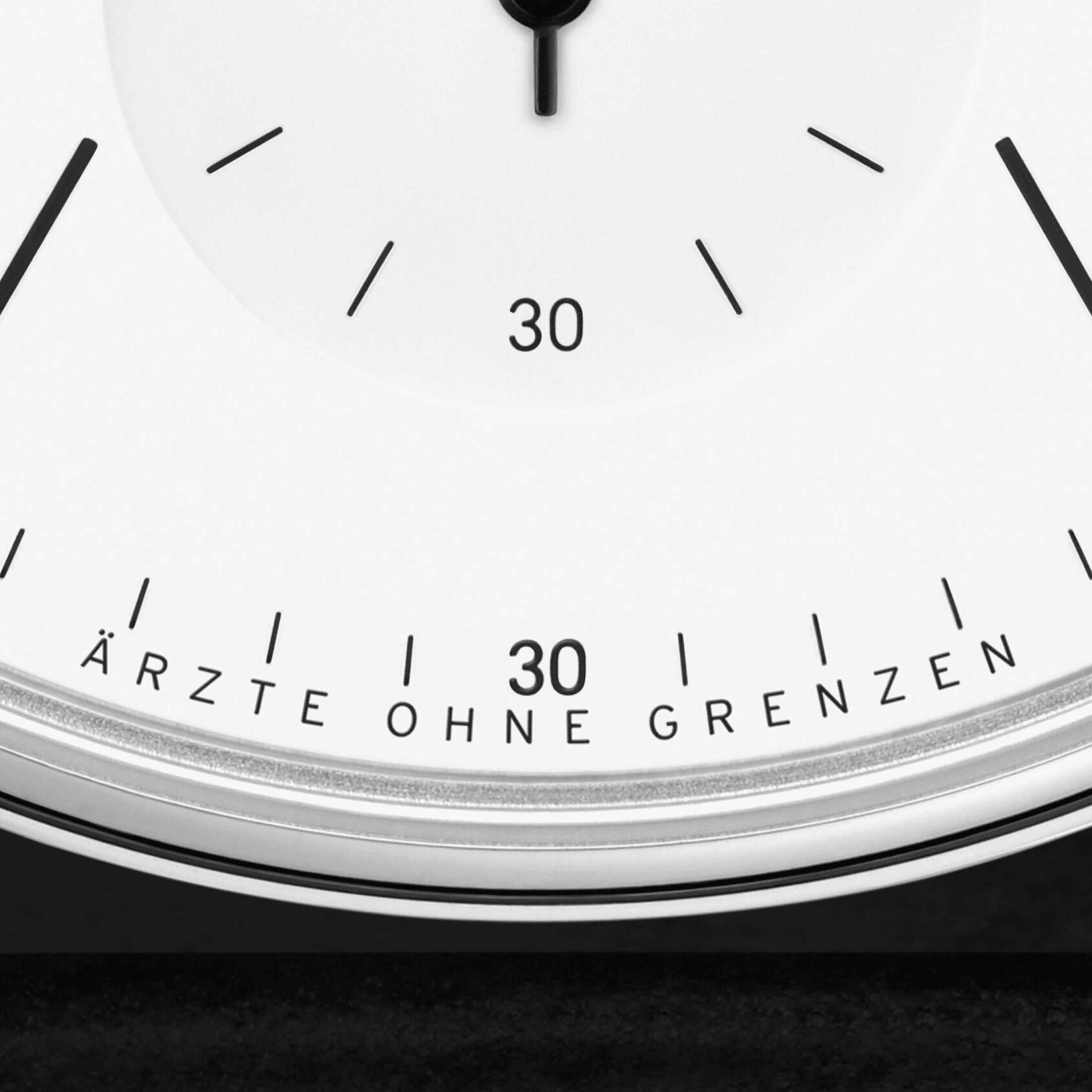 NOMOS Ludwig Neomatik Doctors Without Borders automatic watch white dial black leather strap 36 mm 282.S2