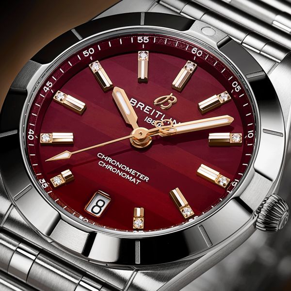 Breitling Chronomat Six Nations Wales quartz watch burgundy dial steel bracelet 32 mm A773108A1K1A1