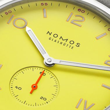 NOMOS Club Campus 38 Starlight mechanical watch sapphire back yellow dial grey velvet strap 36 mm