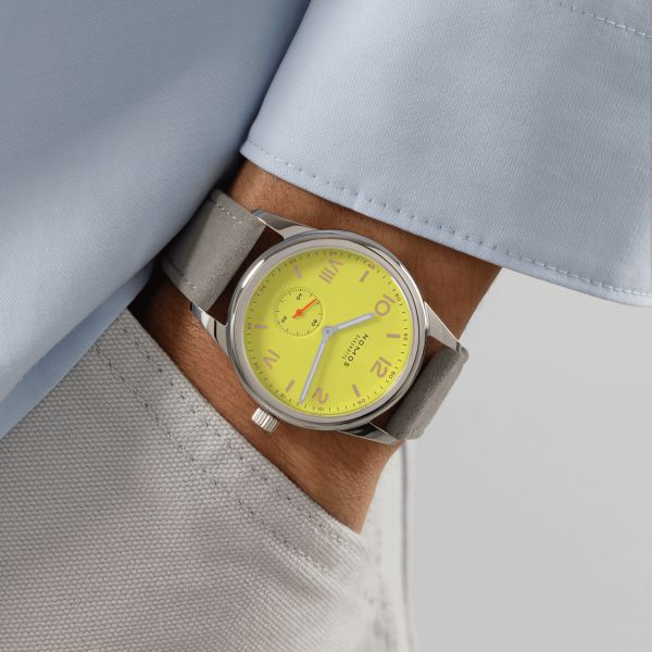 NOMOS Club Campus 38 Starlight mechanical watch sapphire back yellow dial grey velvet strap 36 mm