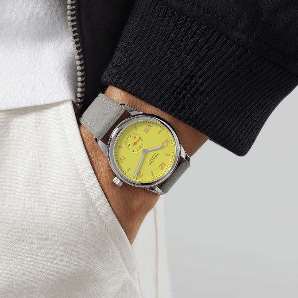 NOMOS Club Campus 38 Starlight mechanical watch sapphire back yellow dial grey velvet strap 36 mm