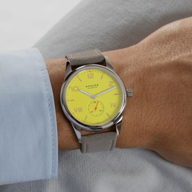 NOMOS Club Campus 38 Starlight mechanical watch sapphire back yellow dial grey velvet strap 36 mm
