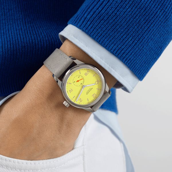 NOMOS Club Campus Starlight mechanical stainless steel watch yellow dial grey velvet strap 36 mm