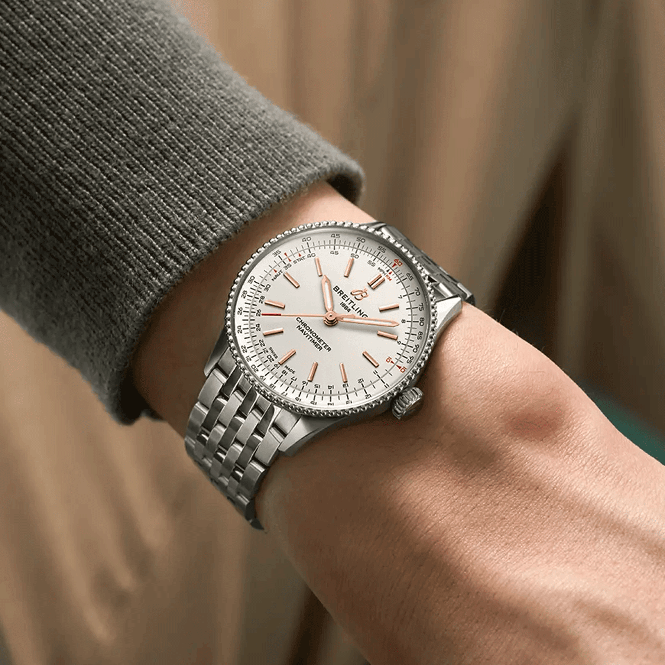 Breitling Navitimer automatic watch silver dial steel bracelet 36 mm A17327211G1A1