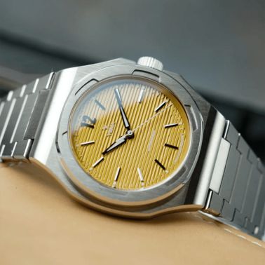 Montre Yema Wristmaster Slim CMM.20 Micro-Rotor automatique cadran jaune bracelet acier 39 mm