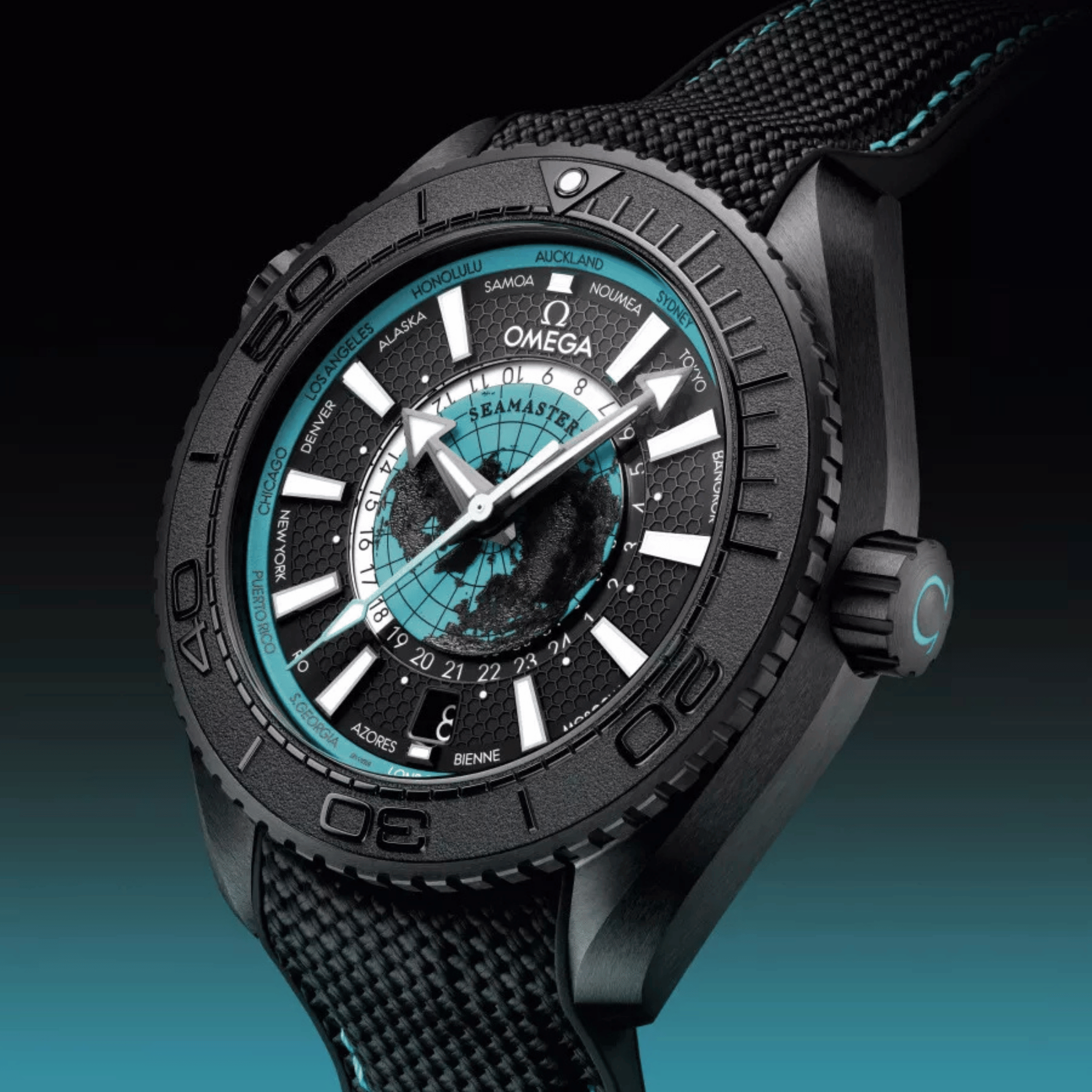 Omega Seamaster Planet Ocean 600M Worldtimer black ceramic turquoise dial rubber strap 45,5 mm