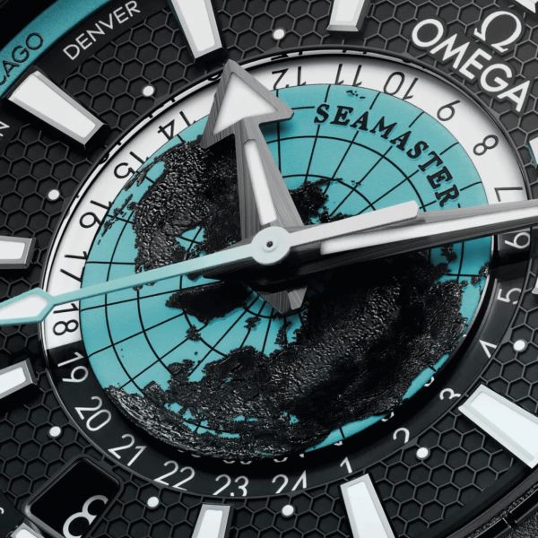 Omega Seamaster Planet Ocean 600M Worldtimer black ceramic turquoise dial rubber strap 45,5 mm