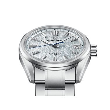 Montre Grand Seiko Evolution 9 Spring Drive U.F.A cadran bleu pâle bracelet titane 37 mm