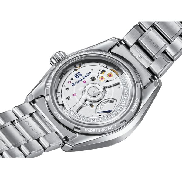 Grand Seiko Evolution 9 Spring Drive U.F.A pale blue dial titanium bracelet 37 mm