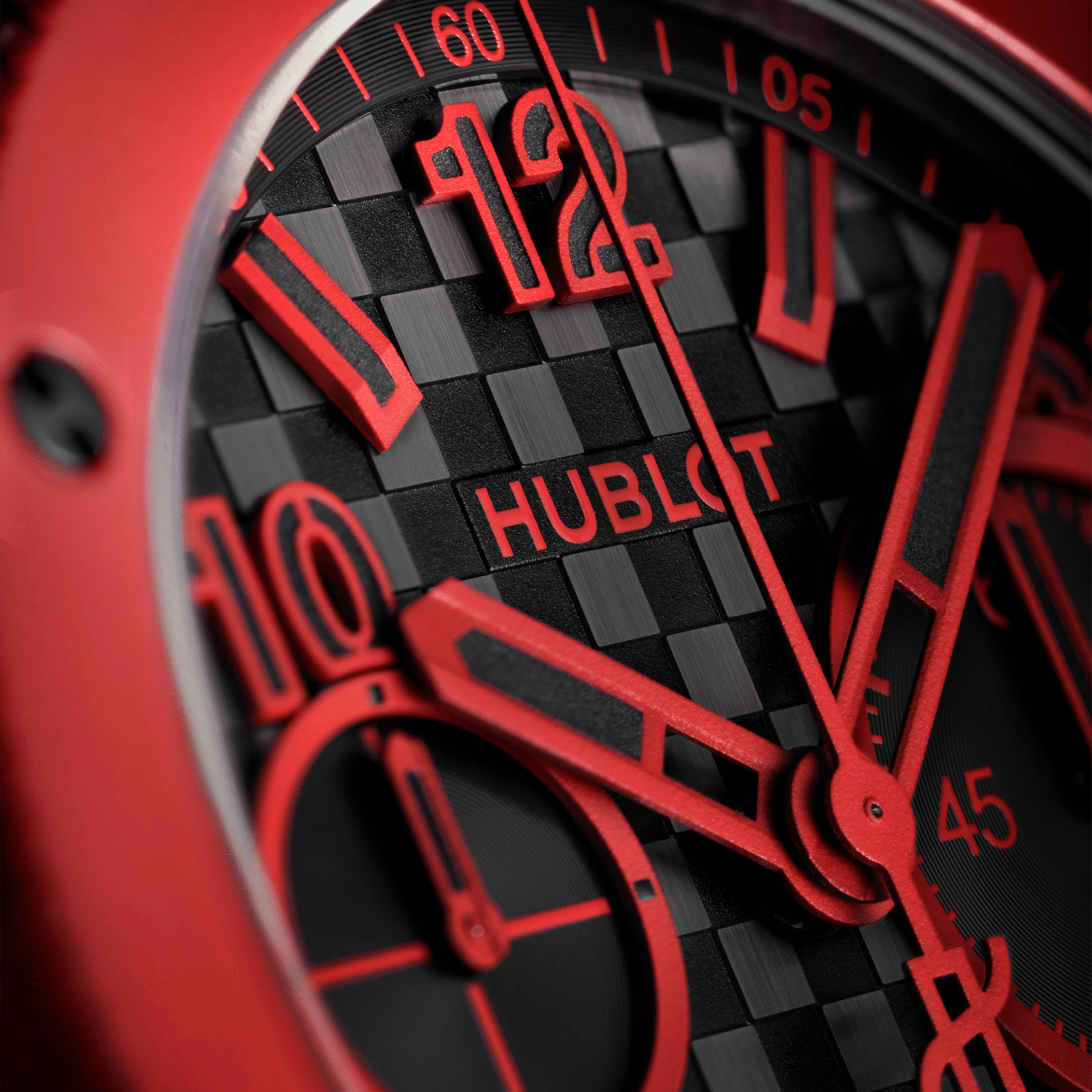 Montre Hublot Big Bang 20ème Anniversaire Red Magic automatique cadran carbone bracelet caoutchouc 43 mm