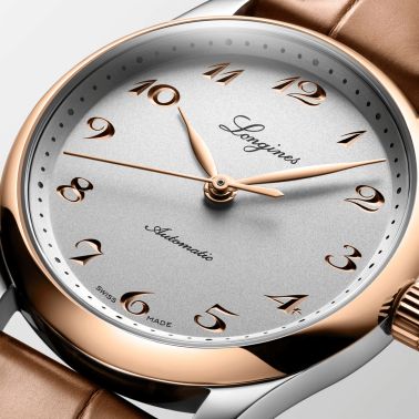 Longines Master Collection watch, steel with rose gold bezel and dial, silver, brown leather strap, 34 mm