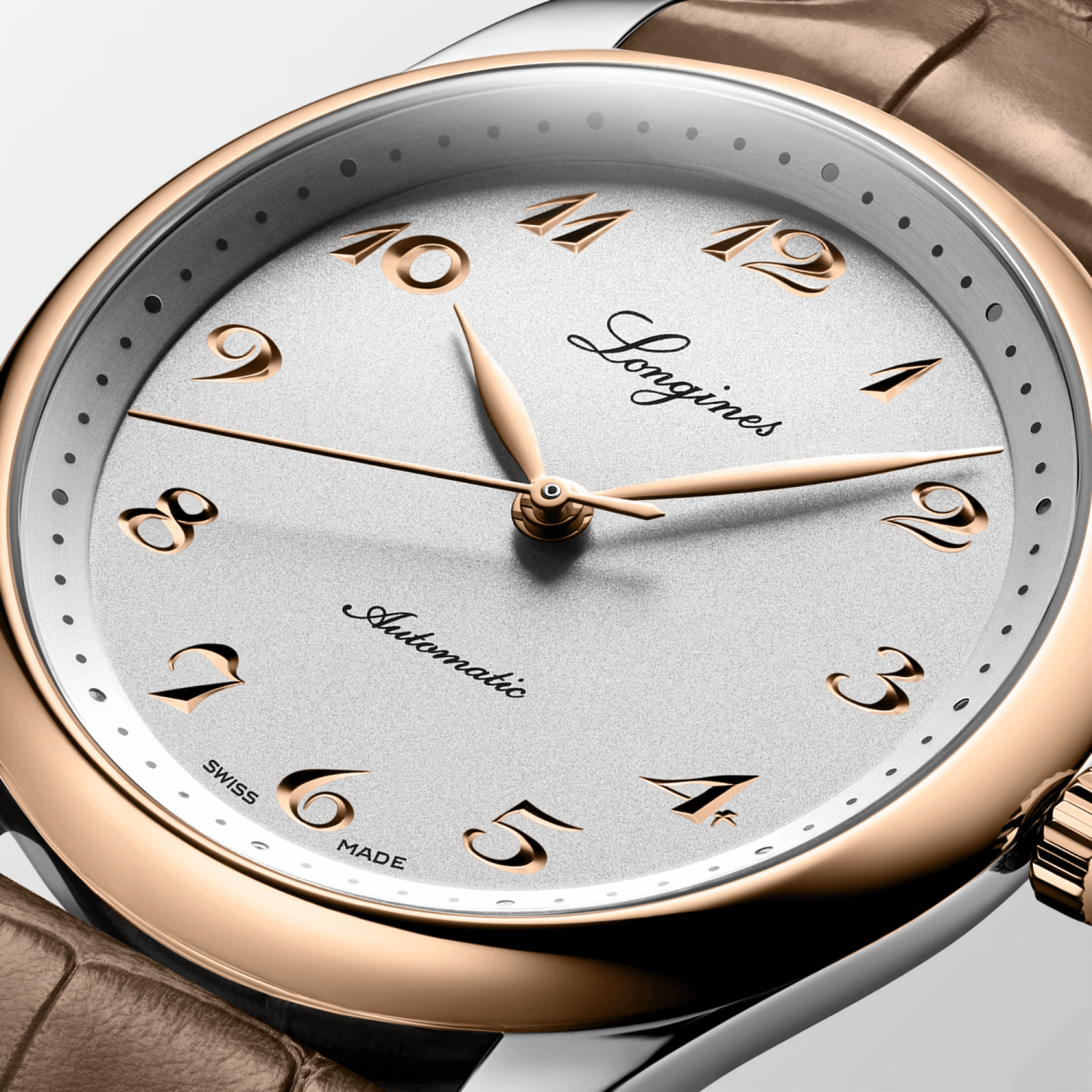 Longines Master Collection watch, stainless steel and pink gold cap, silver dial, brown leather strap, 40 mm