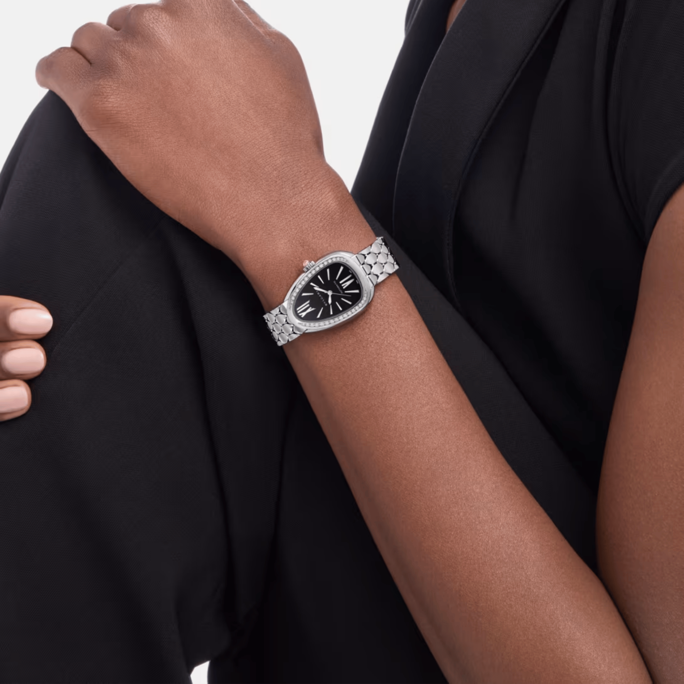 Bulgari Serpenti Seduttori automatic watch bezel set black dial steel bracelet 34 mm