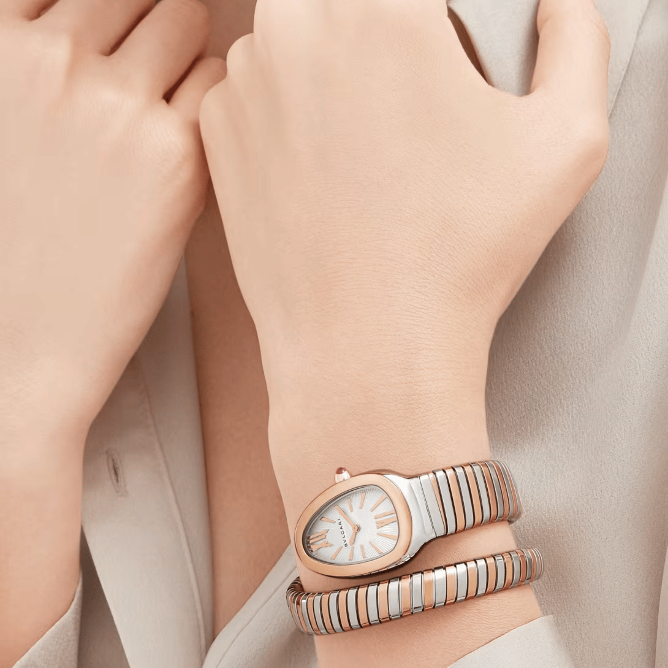 Montre Bulgari Serpenti Tubogas quartz cadran blanc opalin bracelet acier et or rose 35 mm