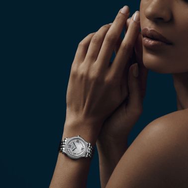 Chopard Happy Sport The First automatic bezel set white mother-of-pearl dial steel bracelet 33 mm