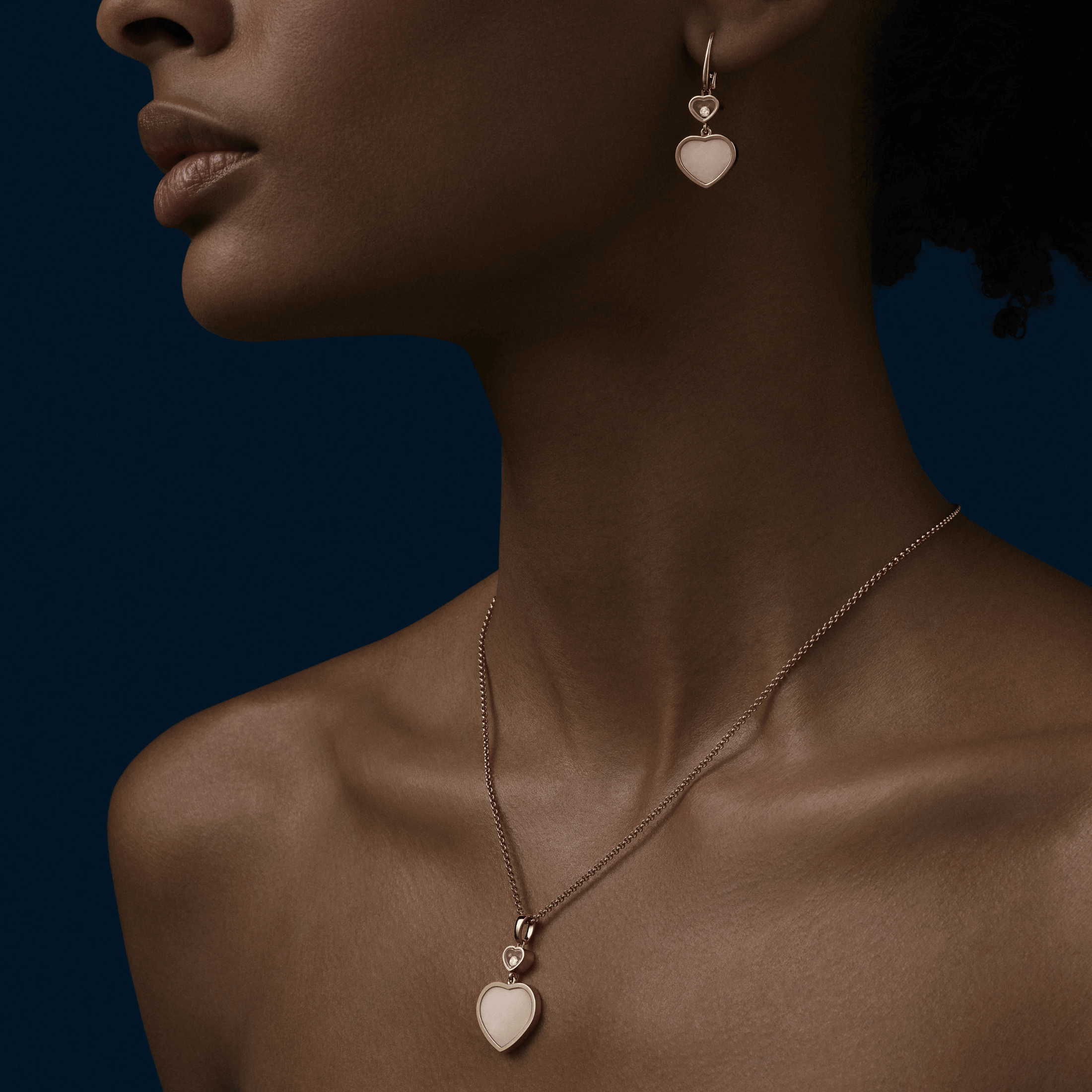 Chopard My Happy Hearts necklace in white gold, opal, and diamonds