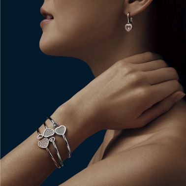Bracelet jonc Chopard Happy Hearts en or rose et pavage de diamants