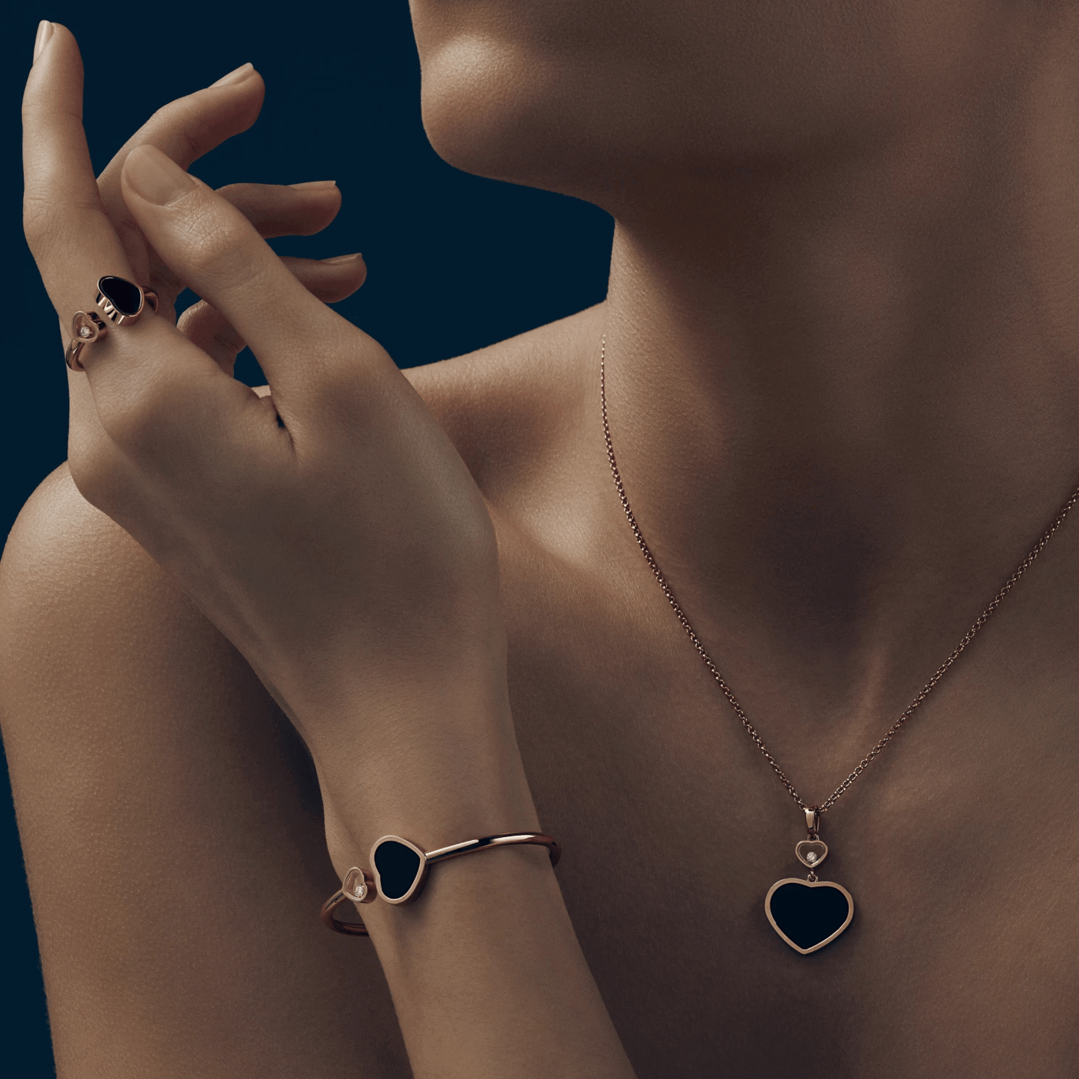 Bague Chopard Happy Hearts en or rose, diamant et onyx