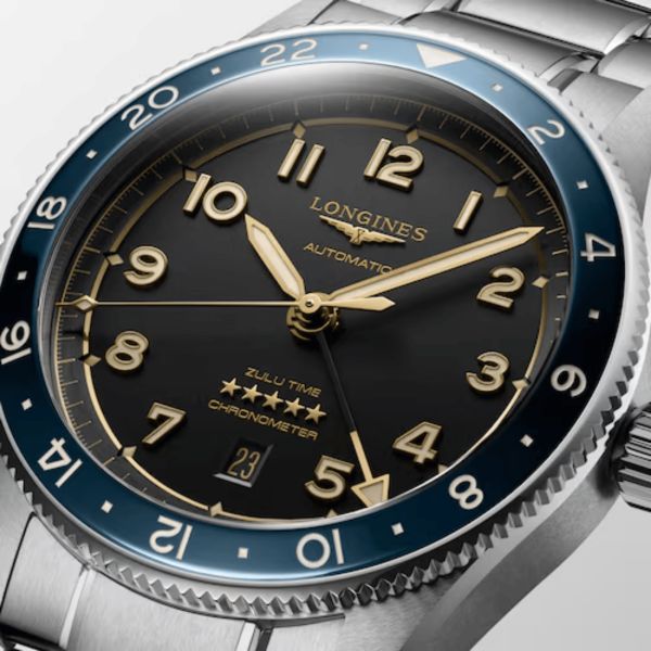 Montre Longines Spirit Zulu Time automatique lunette céramique bleue cadran anthracite bracelet acier 42 mm