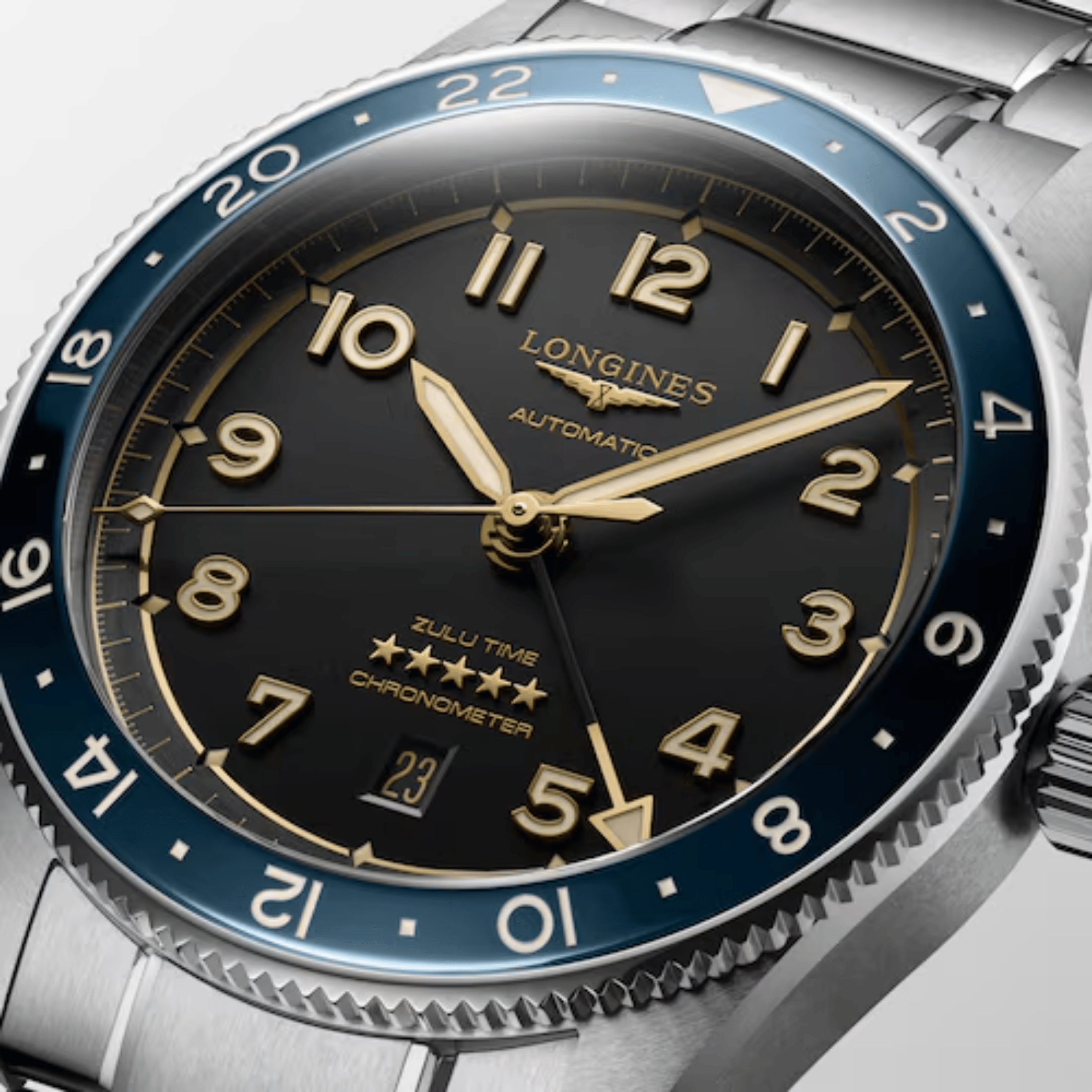 Montre Longines Spirit Zulu Time automatique lunette céramique bleue cadran anthracite bracelet acier 42 mm