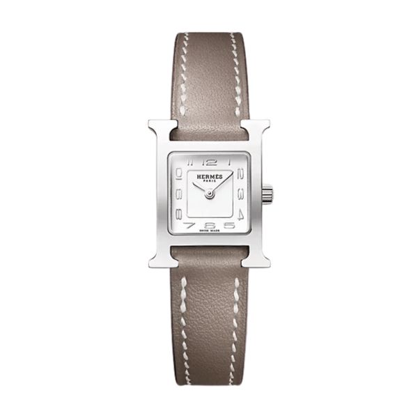 Montre HERMÈS Heure H Mini Modèle quartz cadran argenté bracelet cuir veau Swift étoupe 21 mm