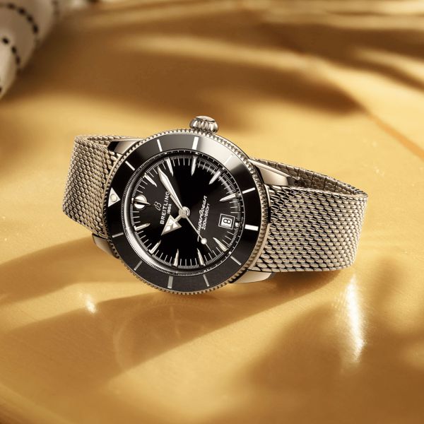 Montre Breitling Superocean Heritage B31 automatique cadran noir bracelet maille milanaise 44 mm