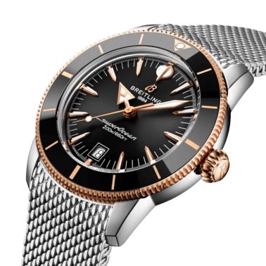 Montre Breitling Superocean Heritage B31 Acier & Or Rouge automatique cadran noir bracelet maille milanaise 42 mm