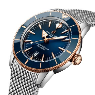 Montre Breitling Superocean Heritage B31 Acier & Or Rouge automatique cadran bleu bracelet maille milanaise 44 mm