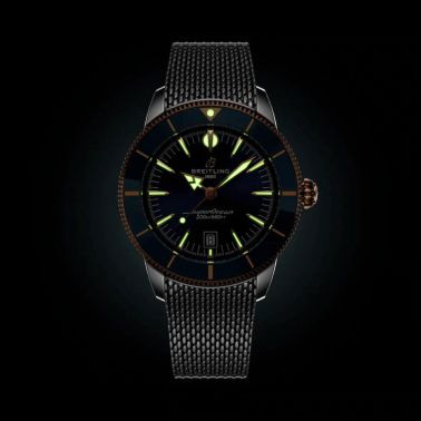 Montre Breitling Superocean Heritage B31 Acier & Or Rouge automatique cadran bleu bracelet maille milanaise 44 mm