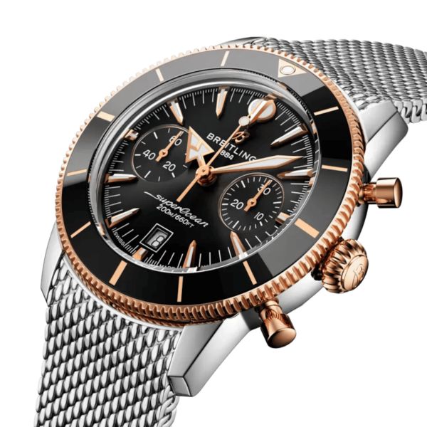 Montre Breitling Superocean Heritage B01 Chrono Acier & Or Rouge automatique cadran noir bracelet maille milanaise 42 mm